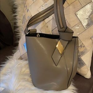 CK bucket bag in light olive oil color with zipper